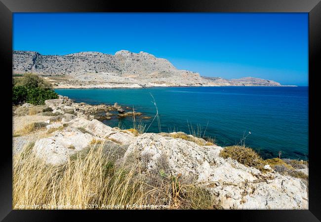 Agathi Beach on the Island of Rhodes Greece Framed Print by Ian Woolcock