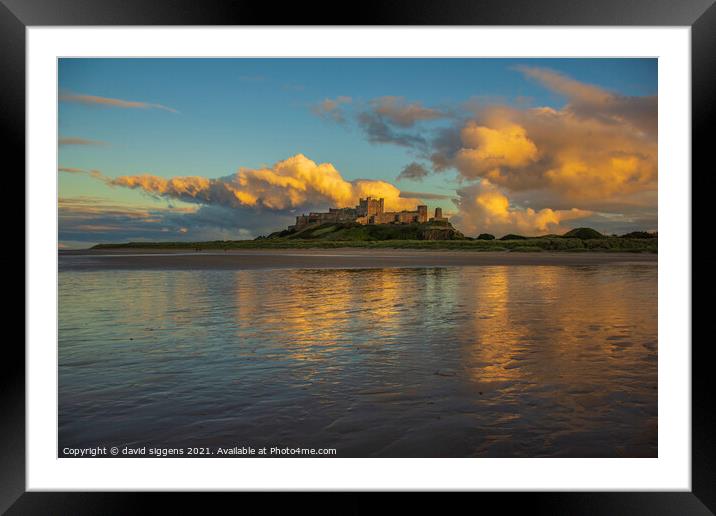 Bamburgh castle beach northumberland Framed Mounted Print by david siggens