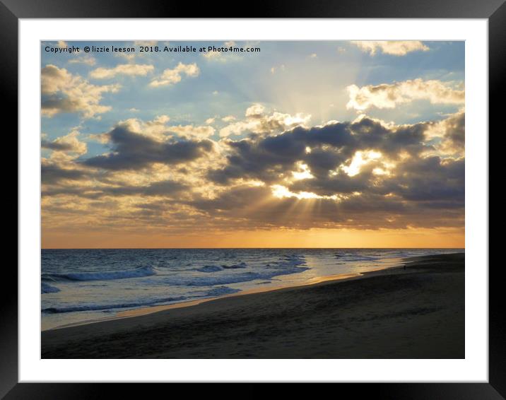 Glowing sunburst sunset  Framed Mounted Print by lizzie leeson