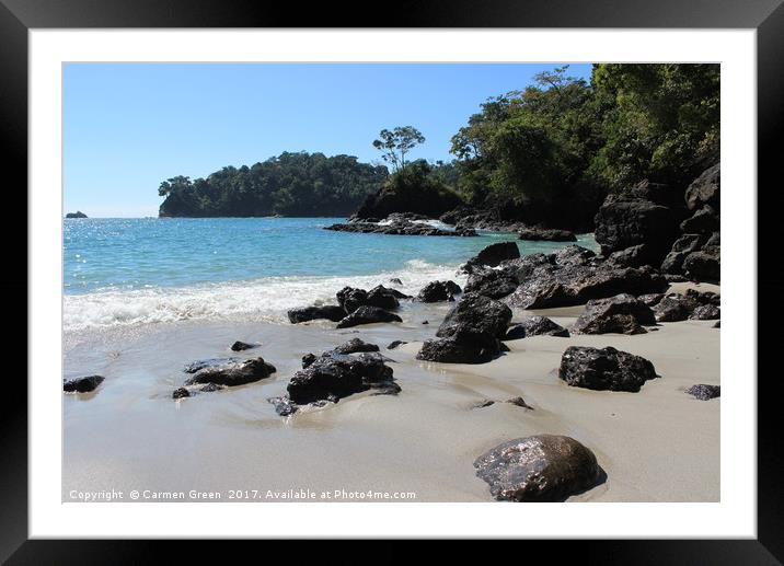 Waves crashing against the rocks on the beach Framed Mounted Print by Carmen Green