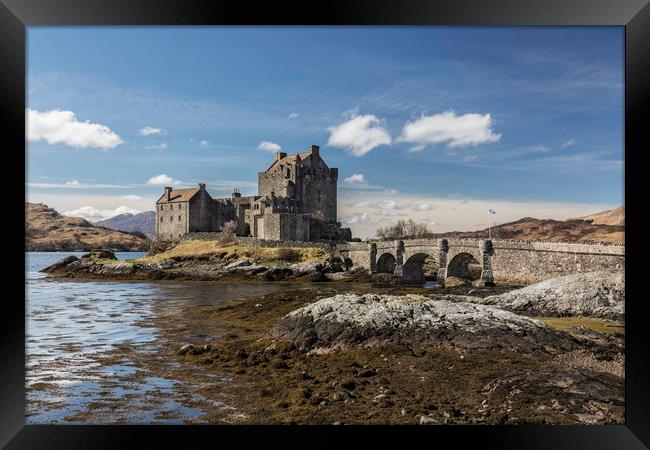Eilean Donan Castle on a sunny day Framed Print by Peter Scott