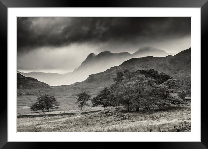 Langdale Pike vs the storm Framed Mounted Print by Peter Scott