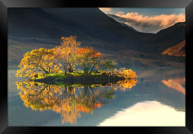 Holme Island ablaze in the sunlight Framed Print by Peter Scott