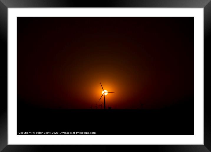 sunsetting behind Oklahoma wind farm Framed Mounted Print by Peter Scott