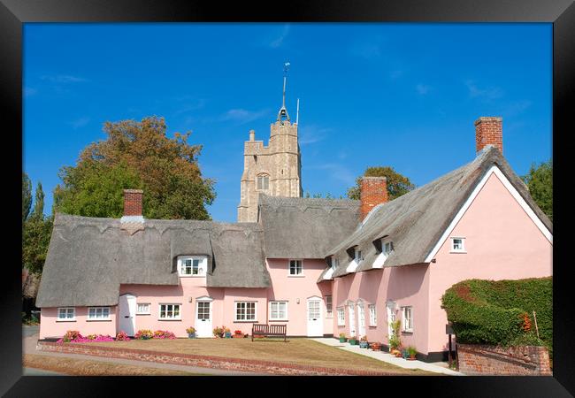 The pink cottages, in front of St Mary's Church, C Framed Print by Andrew Sharpe