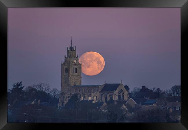 Snow Moon (or Hunger Moon) setting behind St Andre Framed Print by Andrew Sharpe