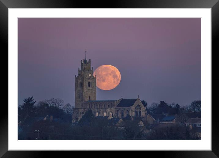 Snow Moon (or Hunger Moon) setting behind St Andre Framed Mounted Print by Andrew Sharpe