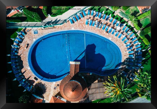 Top down aerial view of hotel swimming pool with crystal blue water  Framed Print by Alexandre Rotenberg