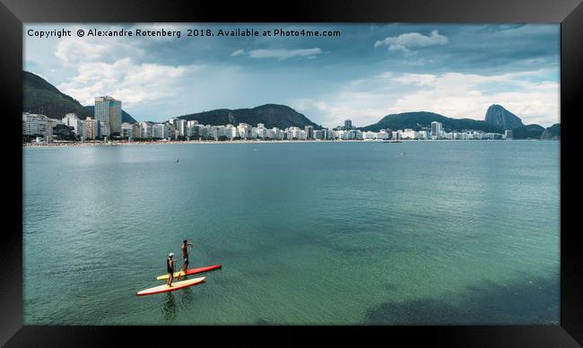 Two men on a Stand Up Paddle on Copacabana Beach,  Framed Print by Alexandre Rotenberg