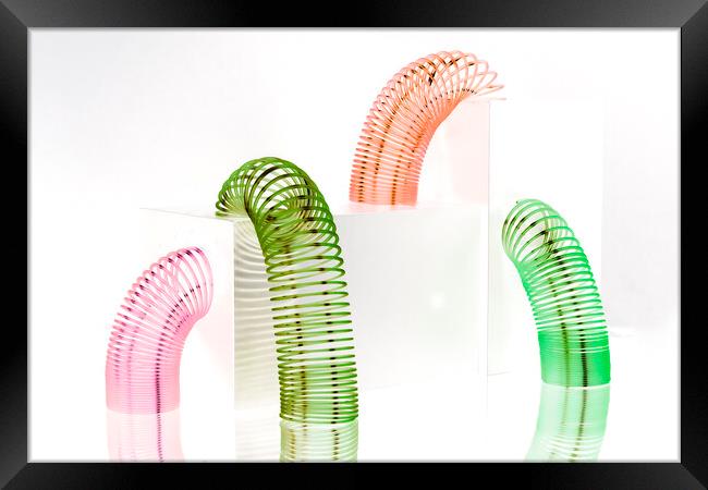 Slinky Set 2 Framed Print by Kelly Bailey