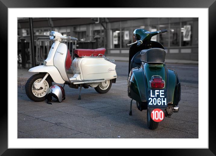 Vespa Sprint and Lambretta Li in town Framed Mounted Print by Donnie Canning