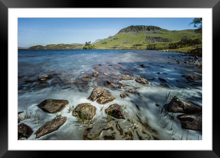 Rocks on the shore of Llynnau Cregennen lake Framed Mounted Print by Tom Radford