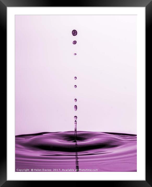 A row of water droplets Framed Mounted Print by Helen Davies