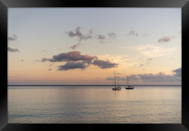 Sailing Boats moored at dusk Framed Print by Ashley Wootton