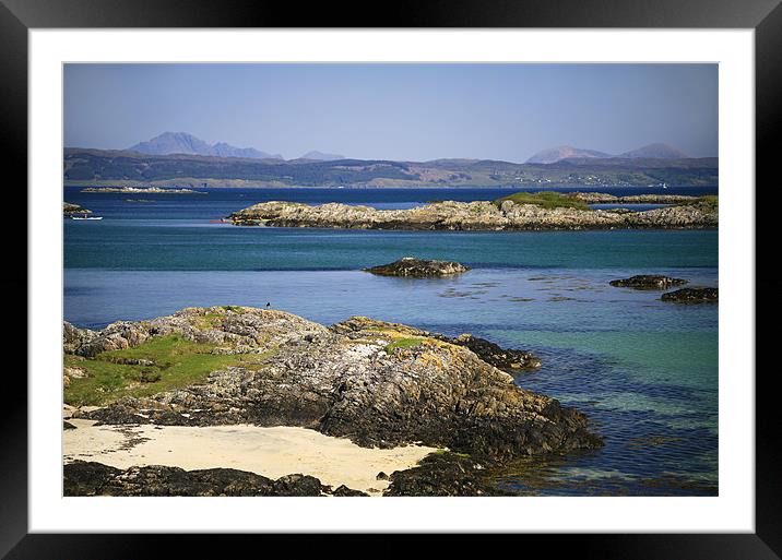 Rocky beach, Skye backdrop, West Scotland Framed Mounted Print by Linda More