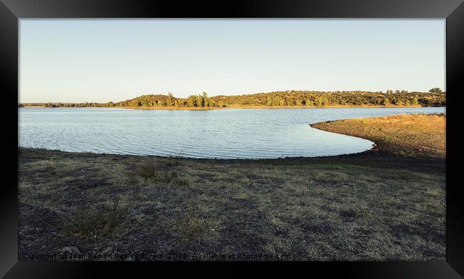Sunny lake with eucalyptus mountain in the backgro Framed Print by Juan Ramón Ramos Rivero