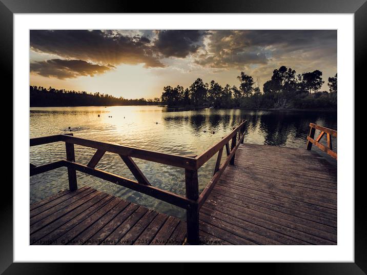 Pier with wooden railing and trees Framed Mounted Print by Juan Ramón Ramos Rivero