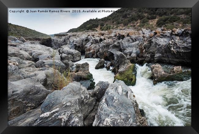 Guadiana River descending with force between Framed Print by Juan Ramón Ramos Rivero