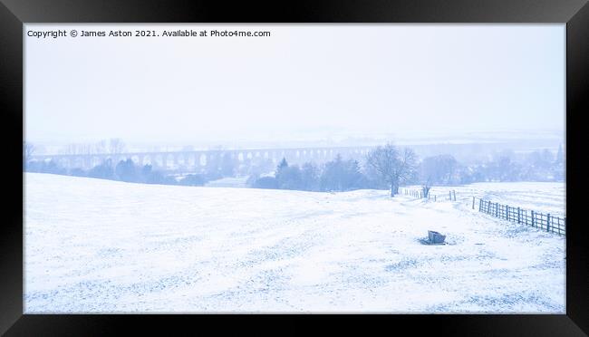 Blizzard conditions in Harringworth Framed Print by James Aston