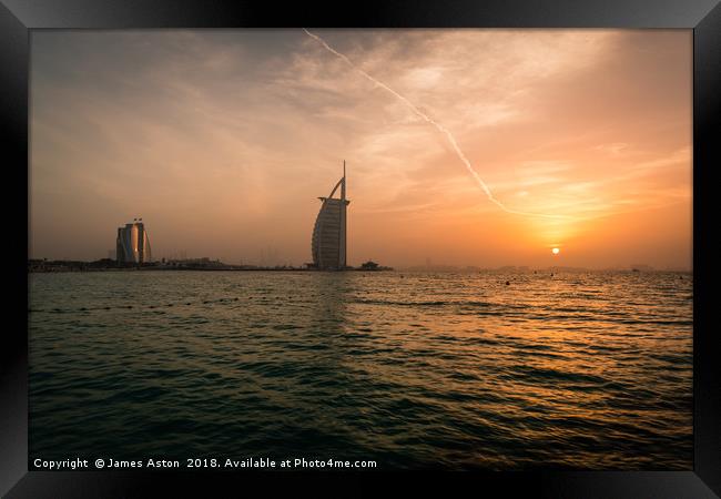 Sunset over the Palm Dubai Framed Print by James Aston