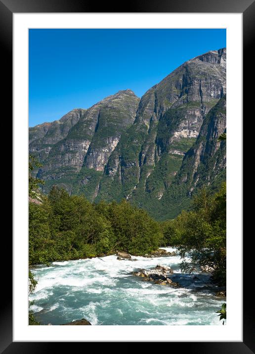 River through the mountains near Briksdals Glacier Framed Mounted Print by Andrew Michael