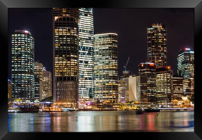 Brisbane city skyline after dark Framed Print by Andrew Michael
