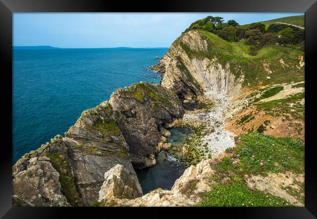 Dramatic coastal scenery at Lulworth Cove Framed Print by Andrew Michael
