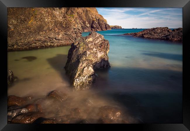 Rocky coastal scenery at Kynance Cove Framed Print by Andrew Michael