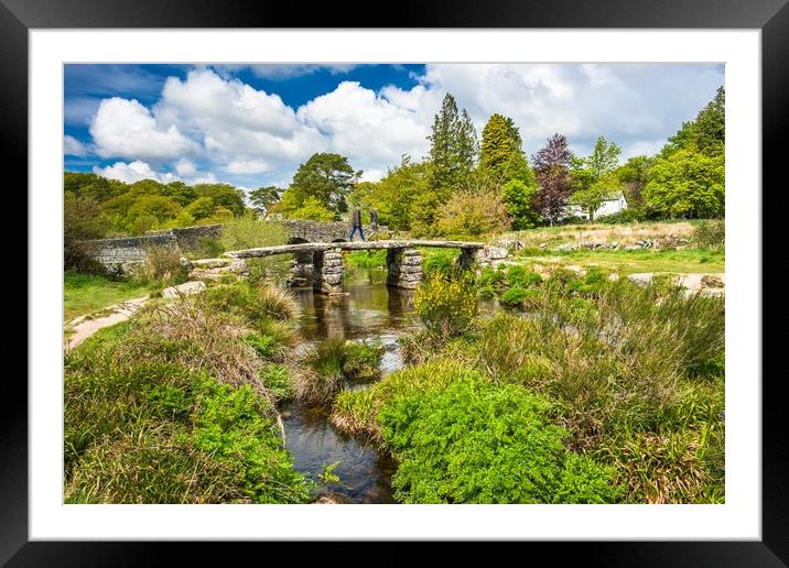 Medieval clapper bridge over the East Dart River Framed Mounted Print by Andrew Michael