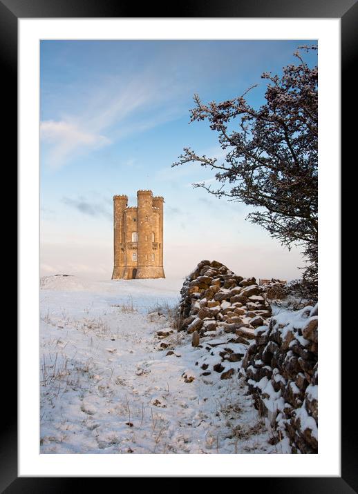 Broadway tower in winter snow.  Framed Mounted Print by Andrew Michael