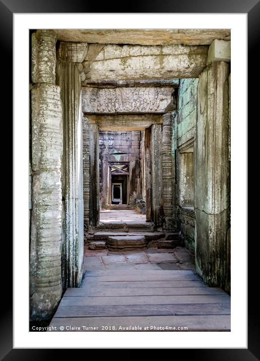 Repeating doorways in ruin Framed Mounted Print by Claire Turner