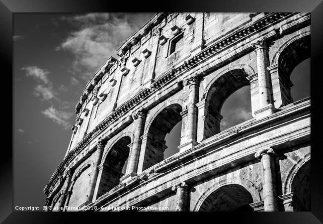 Colosseum arches in black and white Framed Print by Claire Turner