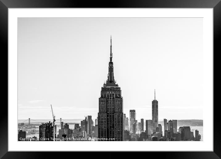 New York skyline and the Empire State Building Framed Mounted Print by Claire Turner