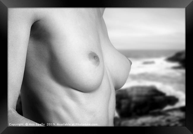 Naked woman against seascape Framed Print by Ann Spells