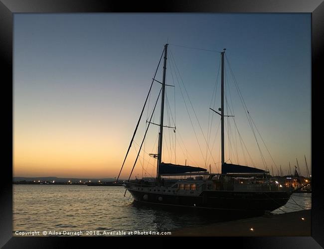 Yacht at sunset, Ortigia, Sicily Framed Print by Ailsa Darragh