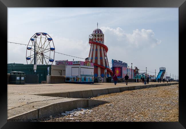 From the beach to the Fun Fair Framed Print by Clive Wells