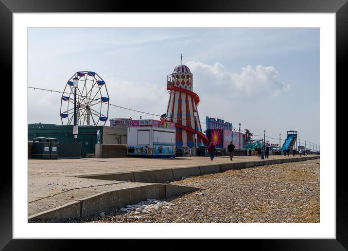 From the beach to the Fun Fair Framed Mounted Print by Clive Wells