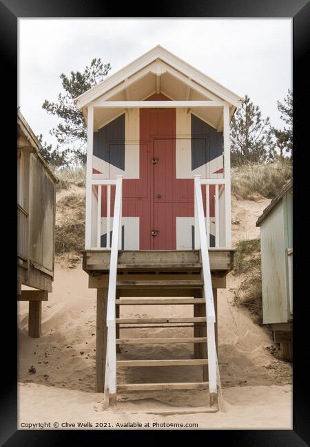 Union jack beach hut Framed Print by Clive Wells