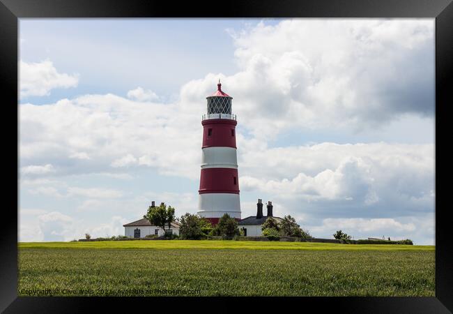 Red and white lighthouse at Happisburgh Framed Print by Clive Wells