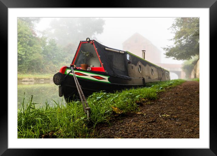 Moored narrow boat in the mist. Framed Mounted Print by Clive Wells