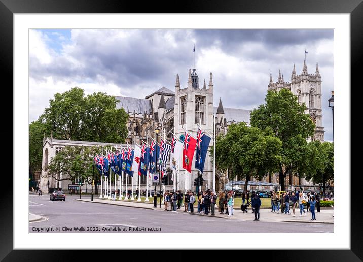 Flags in front of West Minister Cathedral. Framed Mounted Print by Clive Wells