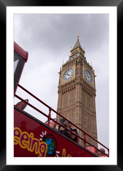 Open top bus under the Elizabeth Tower Framed Mounted Print by Clive Wells