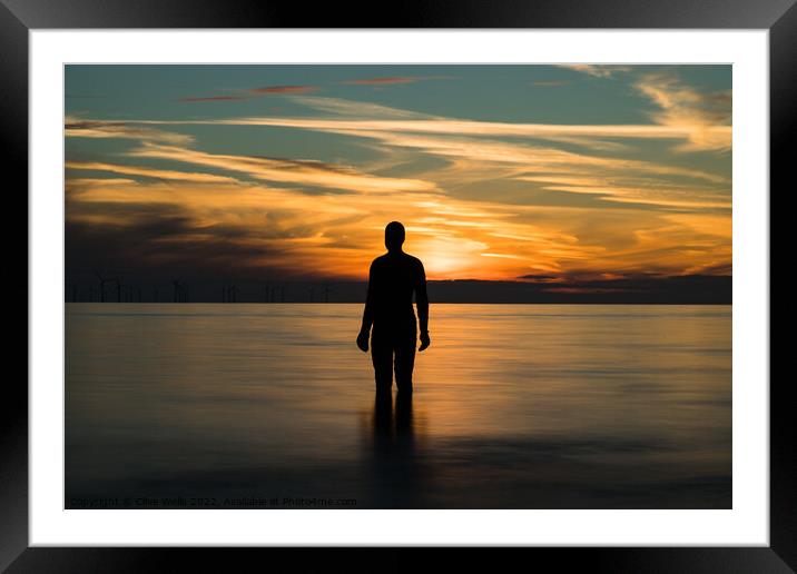 Sunset with an Iron Man Framed Mounted Print by Clive Wells