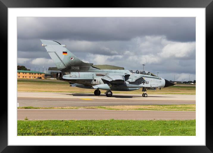 A German Tornado taxi`s to the runway Framed Mounted Print by Clive Wells