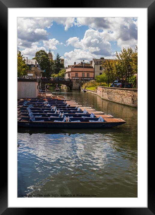 A neat row of punts Framed Mounted Print by Clive Wells