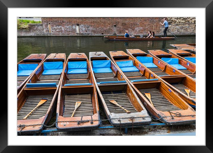 Row of punts Framed Mounted Print by Clive Wells