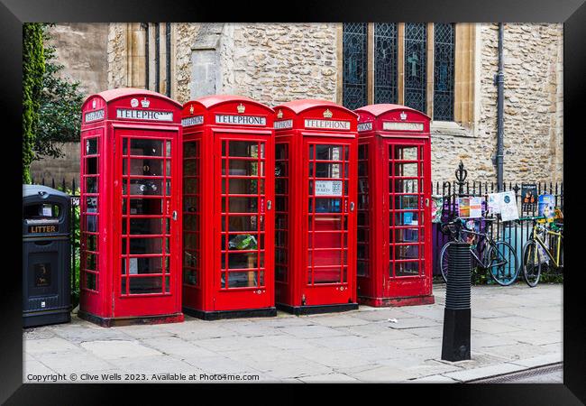 Telephone boxes Framed Print by Clive Wells