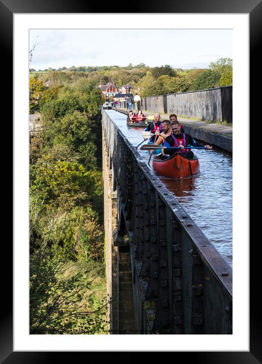 Canoes on the viaduct Framed Mounted Print by Clive Wells