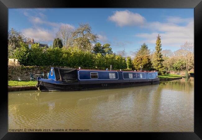 Moored narrow boat Framed Print by Clive Wells