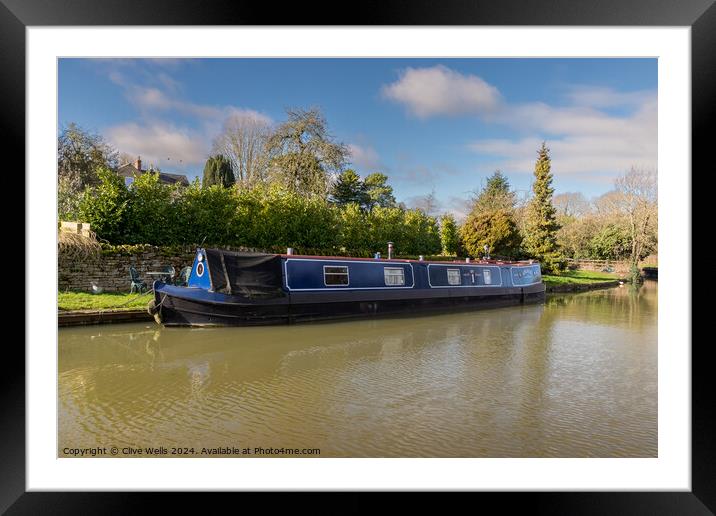 Moored narrow boat Framed Mounted Print by Clive Wells
